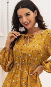 Focus floral print tie front ruffle dress wear by an iconic woman