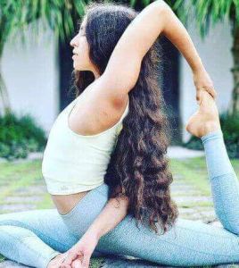 Unique yoga woman training viewed in the nature